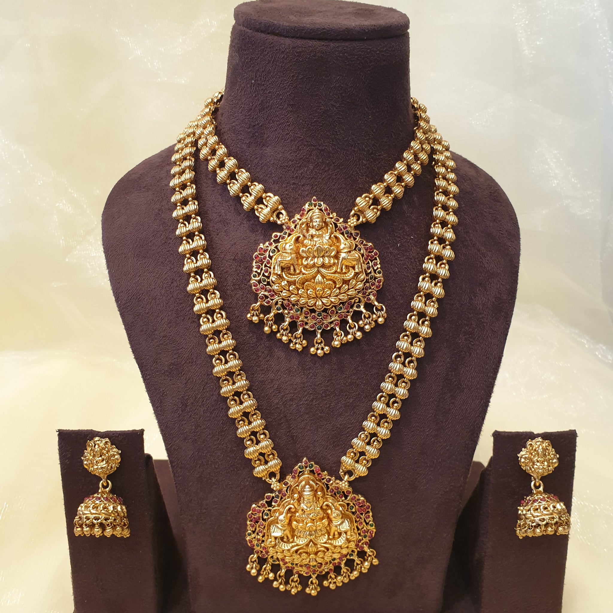 Gold-plated long temple necklace set with Lakshmi pendants